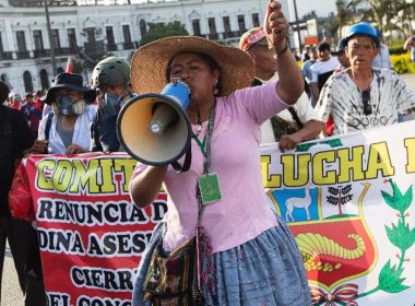 The demonstrations spread in all the regions of the country, here this woman who protest in Lima. AFP/ Lucas AGUAYO