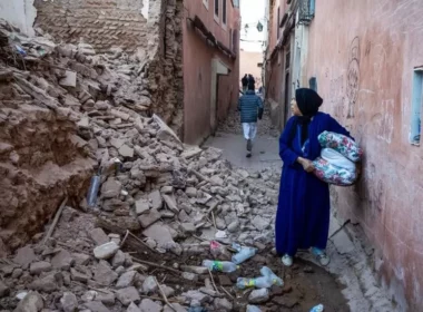 A woman surveys the damage to a building in Marrakesh, after the powerful earthquake struck overnight on Friday/ Getty images