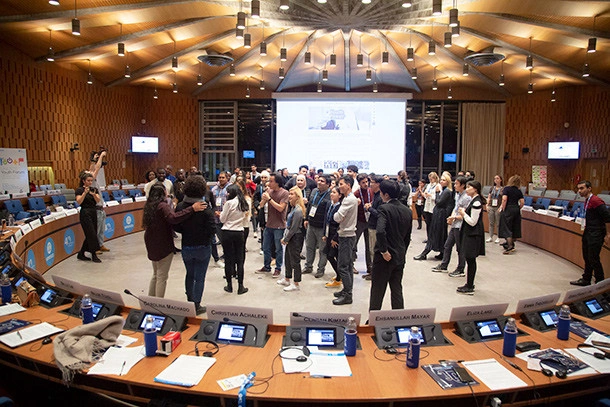 © UNESCO Young leaders from the entire world taking part in a discussion on climate change’s consequences and the way they can be addressed.