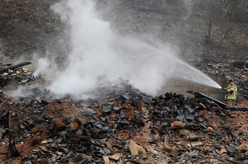 Wildfire in South Korea March 2025 destroying homes and landscape.