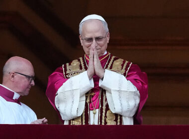 The newly elected Pontiff, Pope Leo XIV is seen for the first time from the Vatican balcony on May 8, 2025 in Vatican City (Photo by Christopher Furlong/Getty Images)