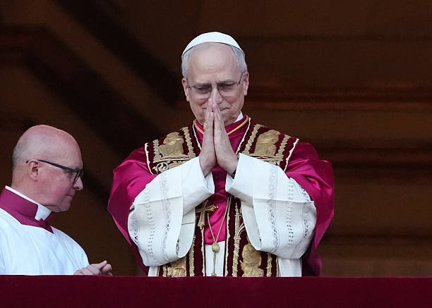 The newly elected Pontiff, Pope Leo XIV is seen for the first time from the Vatican balcony on May 8, 2025 in Vatican City (Photo by Christopher Furlong/Getty Images)