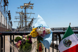 NEW YORK – MAY 19, 2025 – Flowers honor the Cuauhtémoc crew after the ship hit Brooklyn Bridge, killing two. (Photo by Spencer Platt/Getty Images)